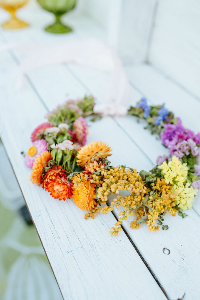 wreath of dried flowers in rainbow colours